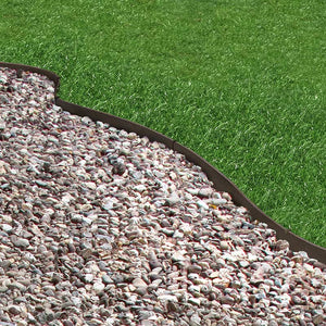 Core Edge Flexible Steel Lawn Edging show in Brown edging dividing grass from gravel path - Edge It Co by Henderson Supply